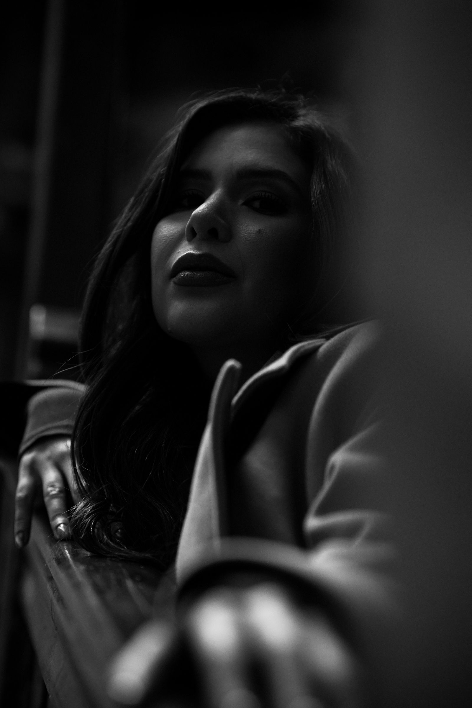 Expressive black and white portrait with dramatic light