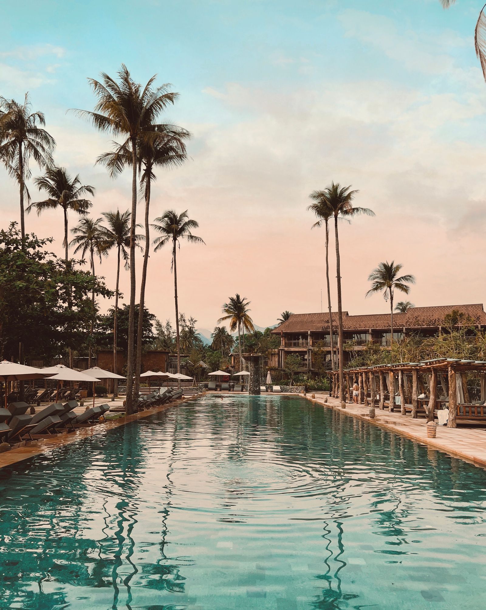 A serene pool at a tropical luxury resort